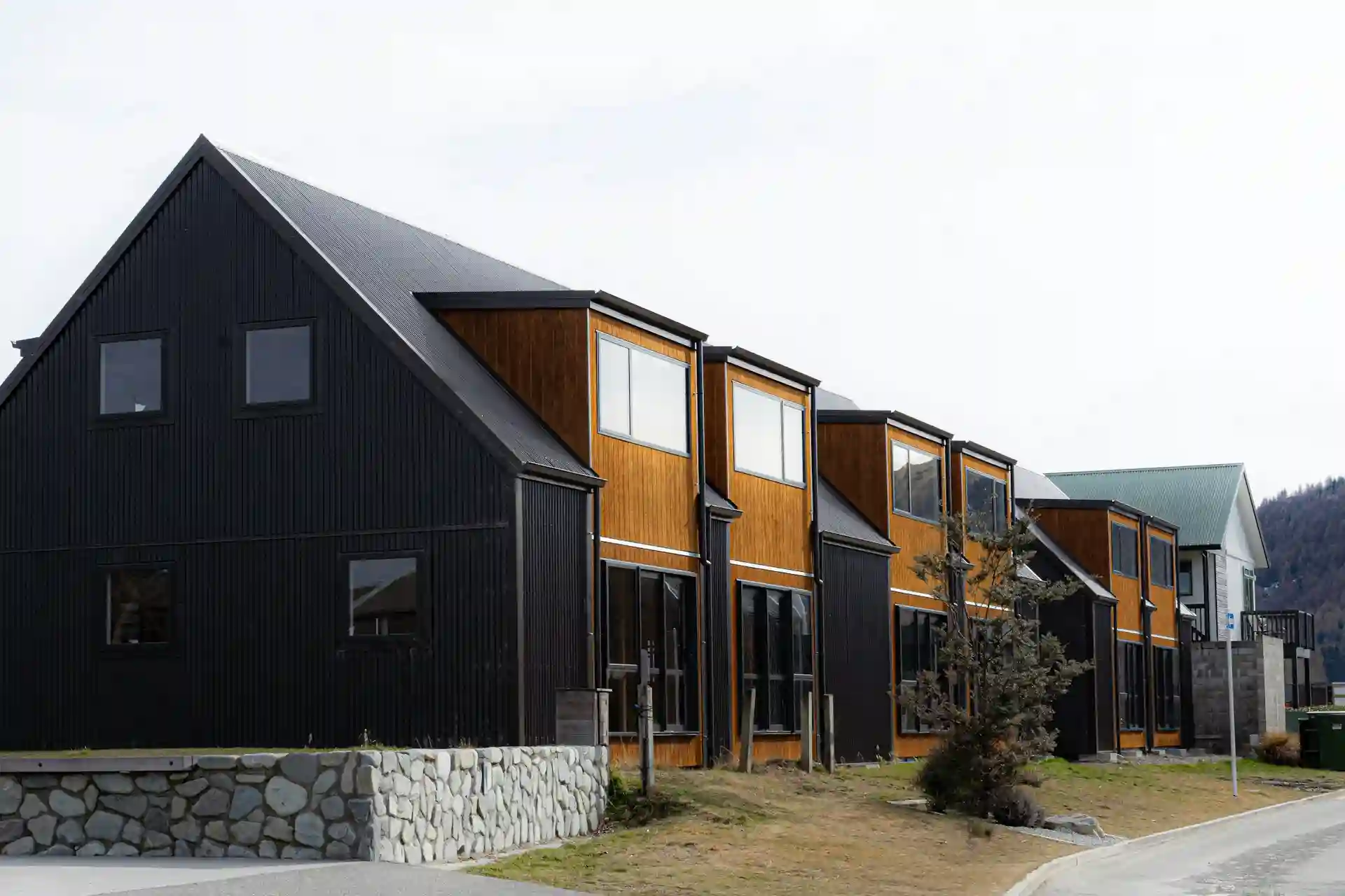 Professional painters working on multifamily housing units