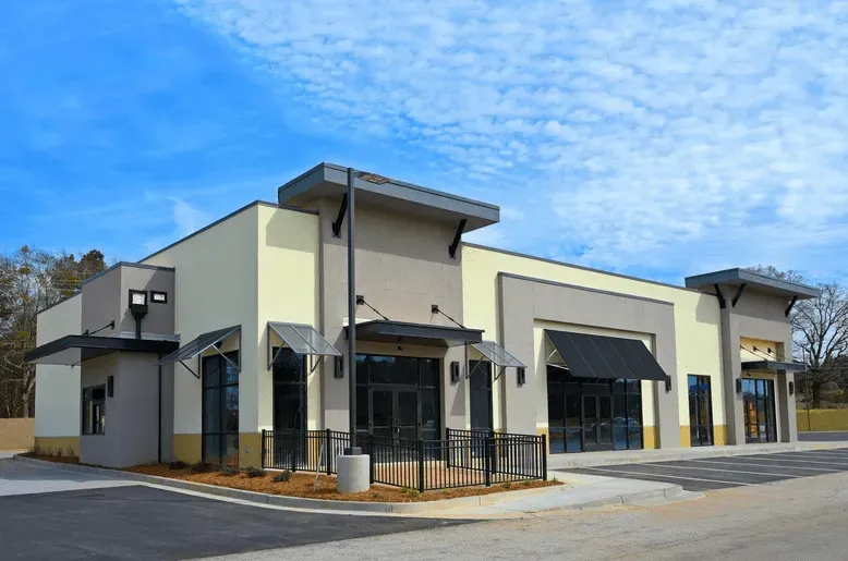 Retail building exterior painted by a Commercial Exterior Painter